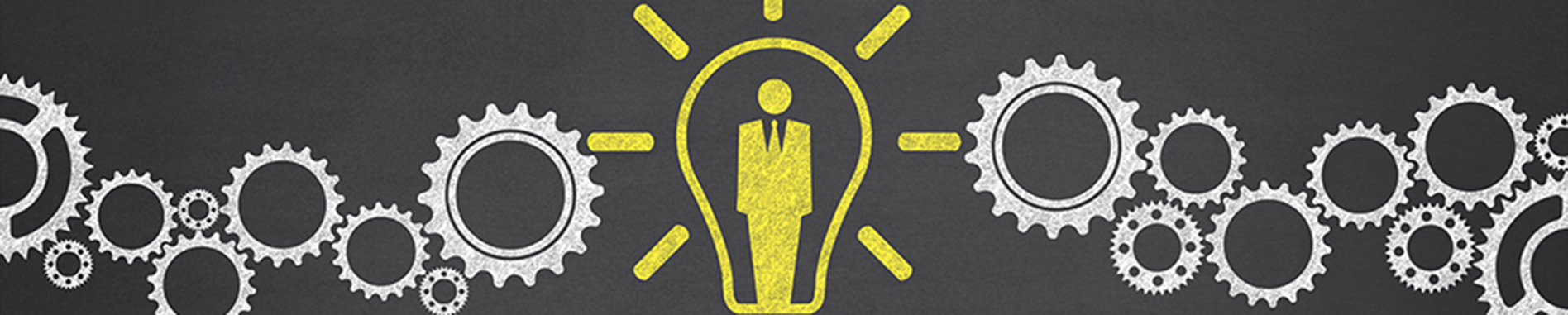 Human resources concept with gears and light bulb which symbolise new business on blackboard.