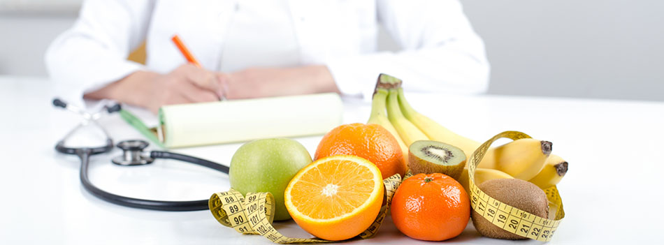 Doctor nutritionist with fruits and vegetable